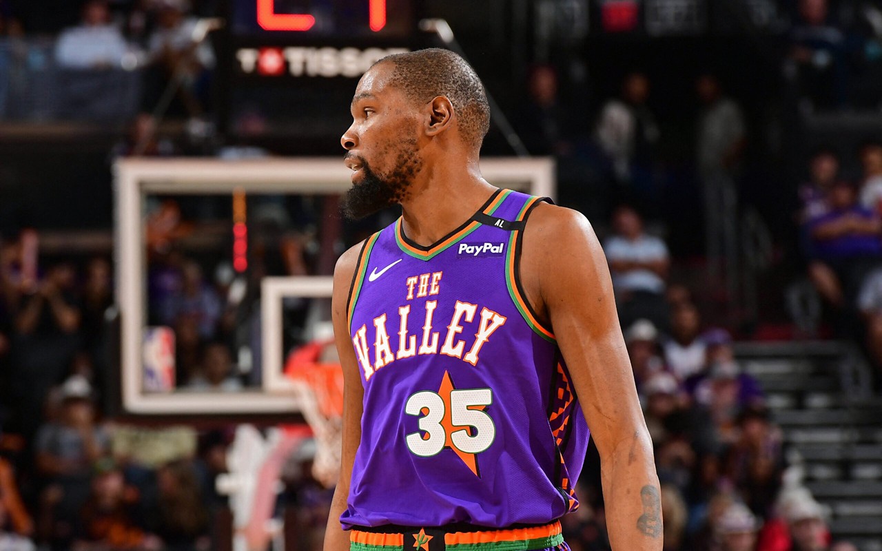 PHOENIX, AZ - MARCH 30: Kevin Durant #35 of the Phoenix Suns looks on during the game against the Houston Rockets on March 30, 2025 at PHX Arena in Phoenix, Arizona. NOTE TO :  expressly acknowledges and agrees that, by ing and or using this photograph,  is consenting to the  and conditions of the Getty Images License Agreement. Mandatory Copyright Notice: Copyright 2025 NBAE Kate Frese/NBAE via Getty Images/AFP (Photo by Kate Frese / NBAE / Getty Images / Getty Images via AFP)