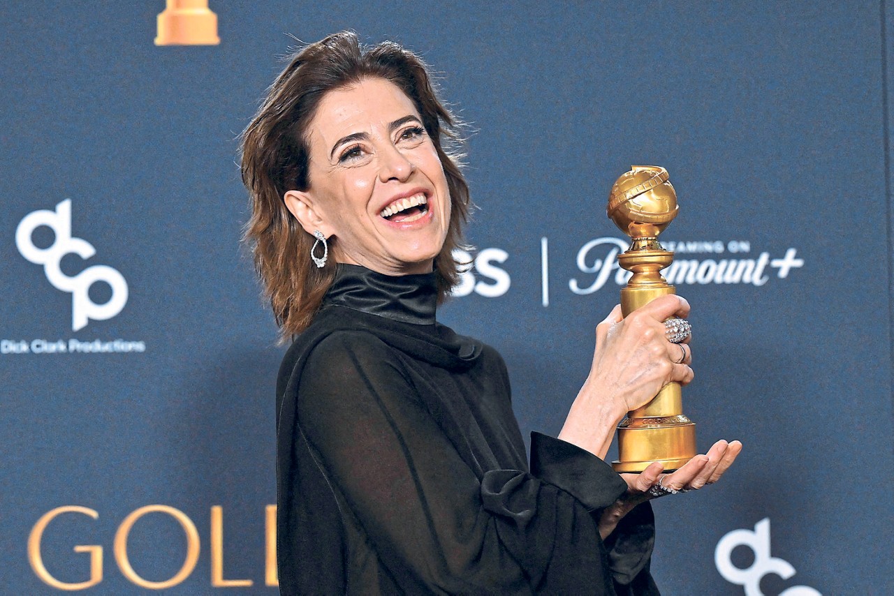Brazilian actress Fernanda Torres poses with the Best Performance by a Female Actor in a Motion Picture   Drama award for "I'm Still Here" in the press room during the 82nd annual Golden Globe Awards at the Beverly Hilton hotel in Beverly Hills, California, on January 5, 2025. (Photo by Robyn Beck / AFP)