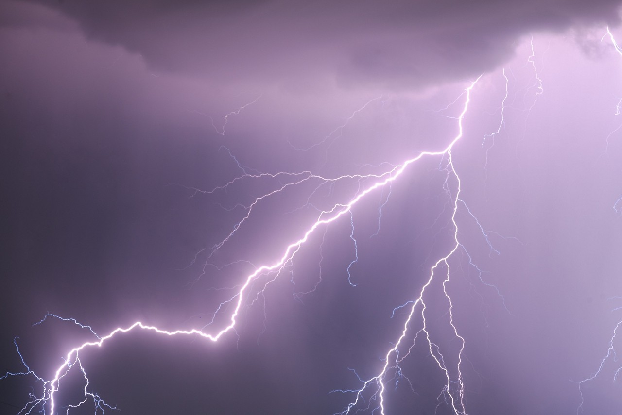 Lightning bolt in the dark night sky in close up.