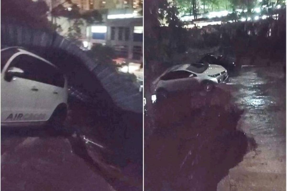Carro fica pendurado na cratera aberta em Paraisópolis