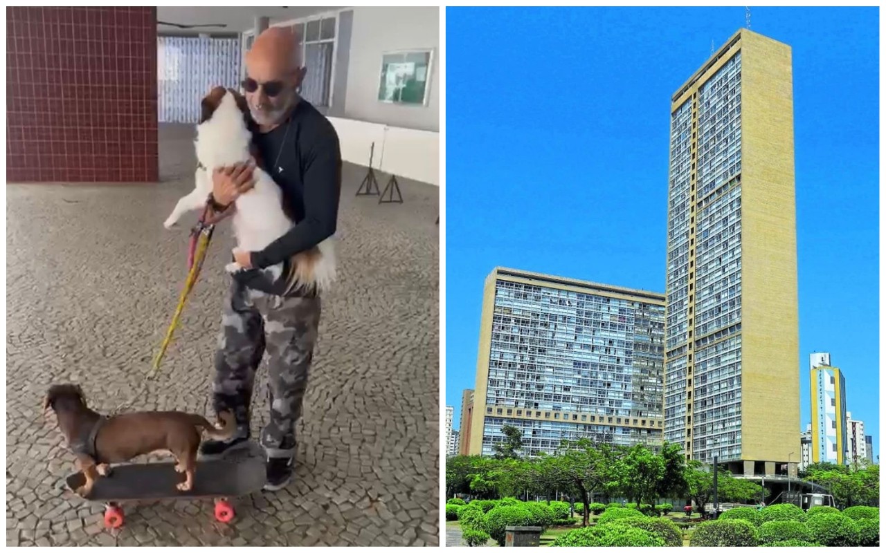 Marco usa um skate para conduzir um dos pets enquanto carrega o outro no colo