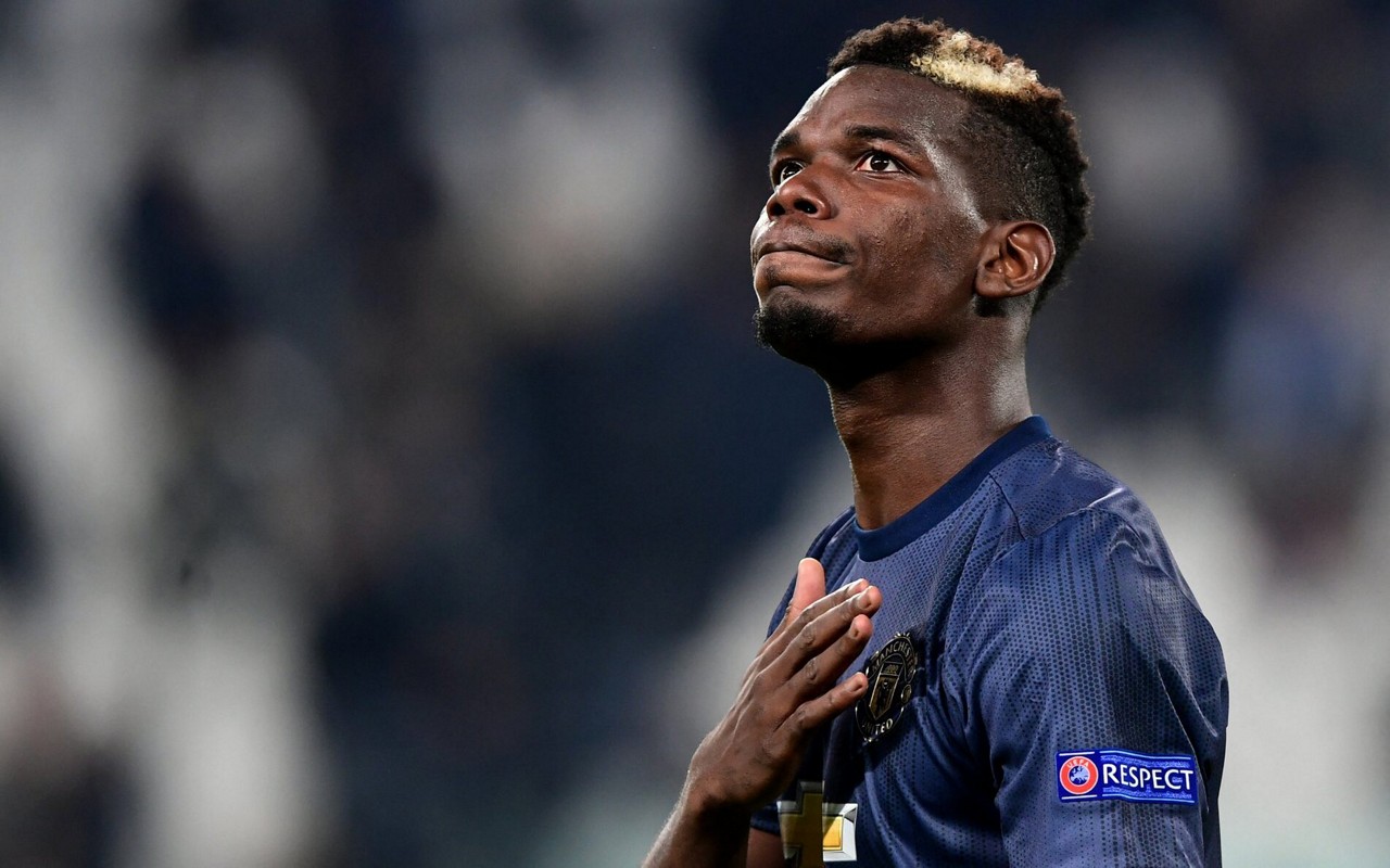 Pogba em jogo pelo Manchester United, na temporada 2018/2019 (Foto: Miguel Medina/AFP)