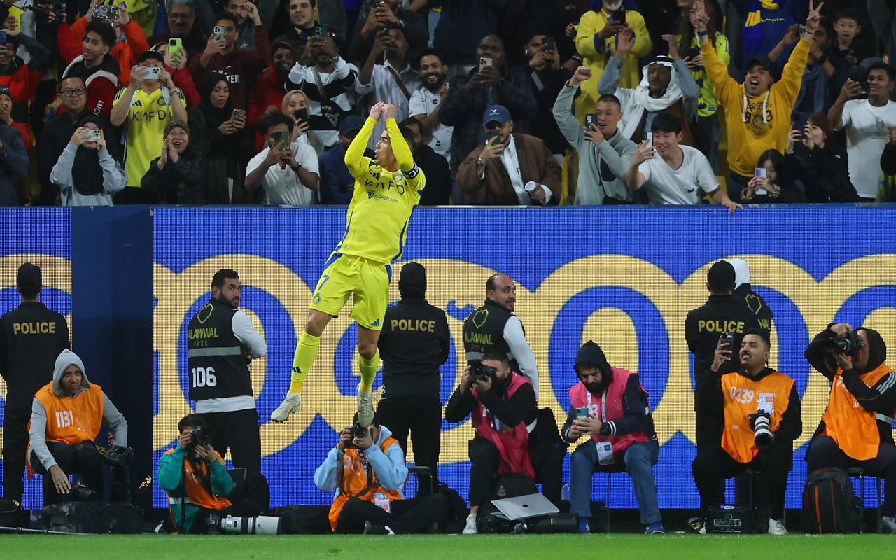 Cristiano Ronaldo em clássica comemoração (Foto: Fayez Nureldine/AFP)