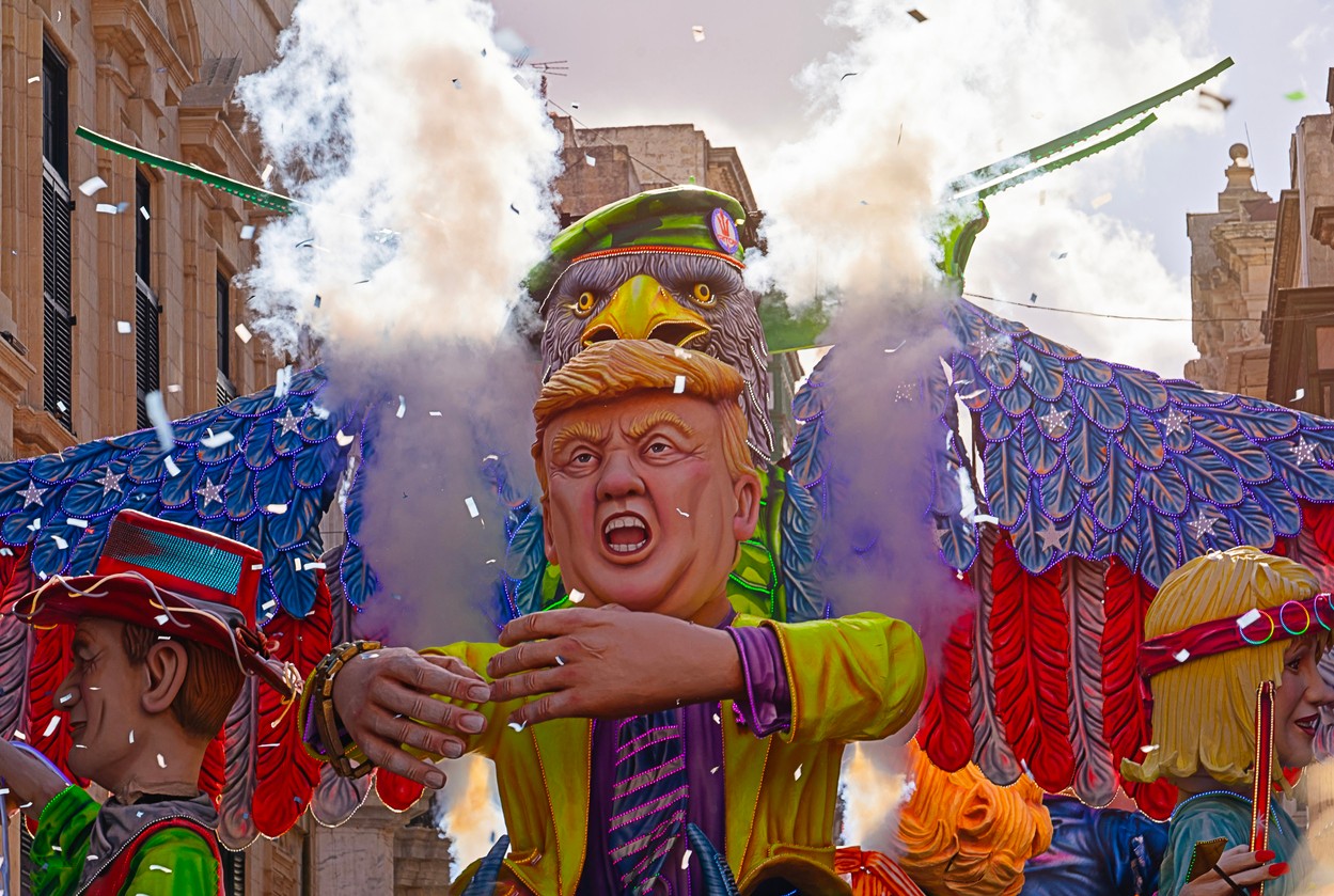 Mardi Gras Grand Parade featuring allegorical floats, including Donald Trump doll, during the carnival celebration on the streets of Valletta, Malta-February 23, 2020