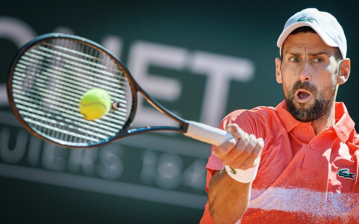 O polonês Hubert Hurkacz na final de Genebra contra Novak Djokovic (Foto: VALENTIN FLAURAUD / AFP)