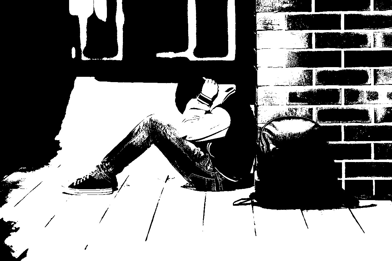 schoolboy crying in the hallway of the school, negative emotion