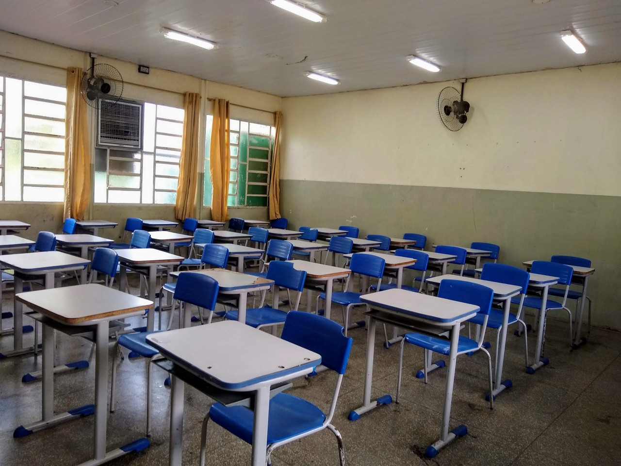 Classroom desks lined up ready to start classes at a school in Brazil.
