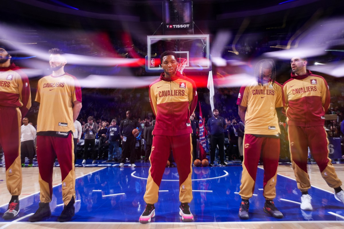 PHILADELPHIA, PA - JANUARY 24: The Cleveland Cavaliers stands for the National Anthem before the game against the Philadelphia 76ers on January 24, 2025 at the Wells Fargo Center in Philadelphia, Pennsylvania NOTE TO USER: User expressly acknowledges and agrees that, by downloading and/or using this Photograph, user is consenting to the terms and conditions of the Getty Images License Agreement. Mandatory Copyright Notice: Copyright 2025 NBAE   Jesse D. Garrabrant/NBAE via Getty Images/AFP (Photo by Jesse D. Garrabrant / NBAE / Getty Images / Getty Images via AFP)