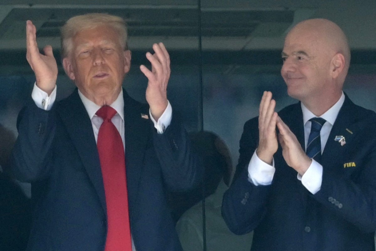 US President Donald Trump (L) and FIFA President Gianni Infantino attend the FIFA Club World Cup 2025 final football match between England's Chelsea and France's Paris Saint-Germain at the MetLife Stadium in East Rutherford, New Jersey on July 13, 2025. (Photo by JUAN MABROMATA / AFP)