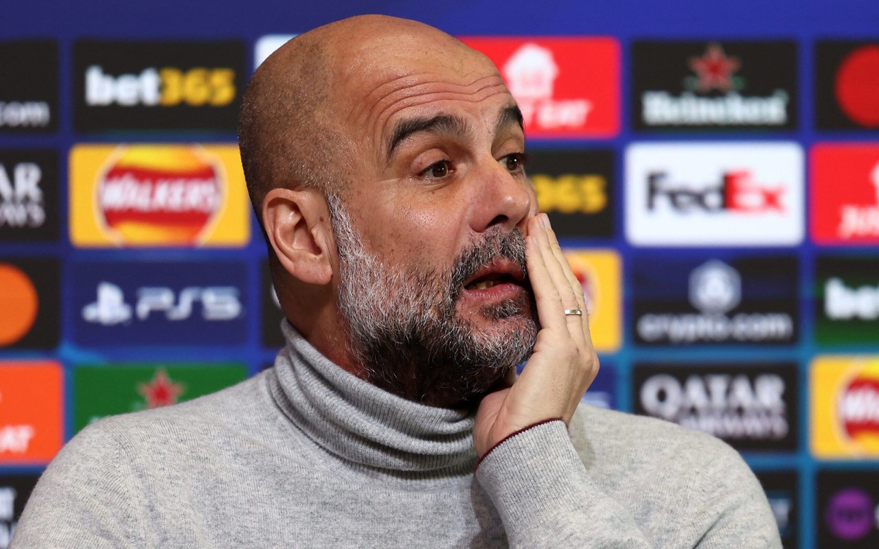 Guardiola em entrevista coletiva pré-rodada de Champions League (Foto: Darren Staples/AFP)