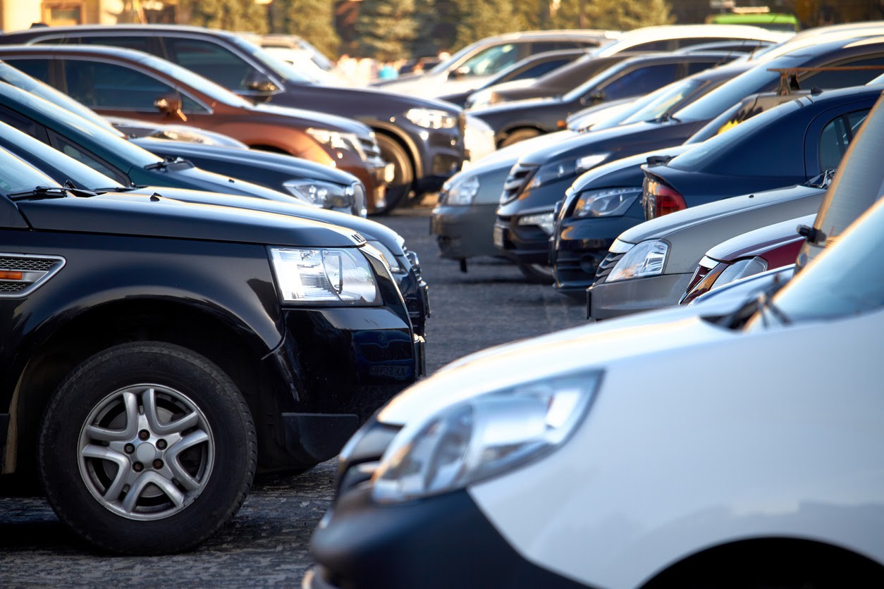Kharkiv, Ukraine - October 14, 2019: Lots of cars in open parking lot, selective focus