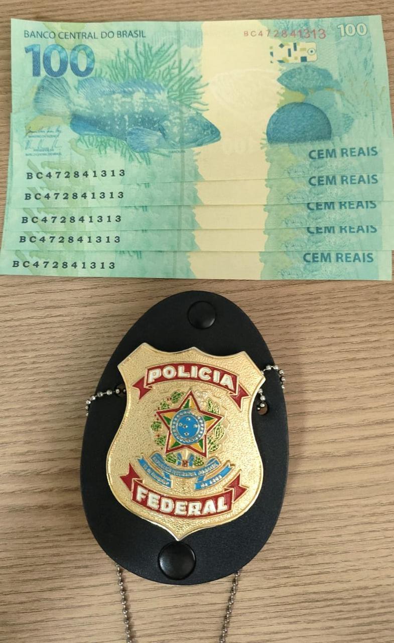 Jovem é preso ao receber cédulas falsas de R$ 100, em Montes Claros