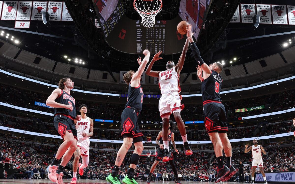 CHICAGO, IL - APRIL 16: Andrew Wiggins #22 of the Miami Heat rebounds the ball during the game against the Chicago Bulls during the 2025 SoFi Play-In Tournament on April 16, 2025 at United Center in Chicago, Illinois. NOTE TO USER: User expressly acknowledges and agrees that, by downloading and or using this photograph, User is consenting to the terms and conditions of the Getty Images License Agreement. Mandatory Copyright Notice: Copyright 2025 NBAE   Jeff Haynes/NBAE via Getty Images/AFP (Photo by JEFF HAYNES / NBAE / Getty Images / Getty Images via AFP)