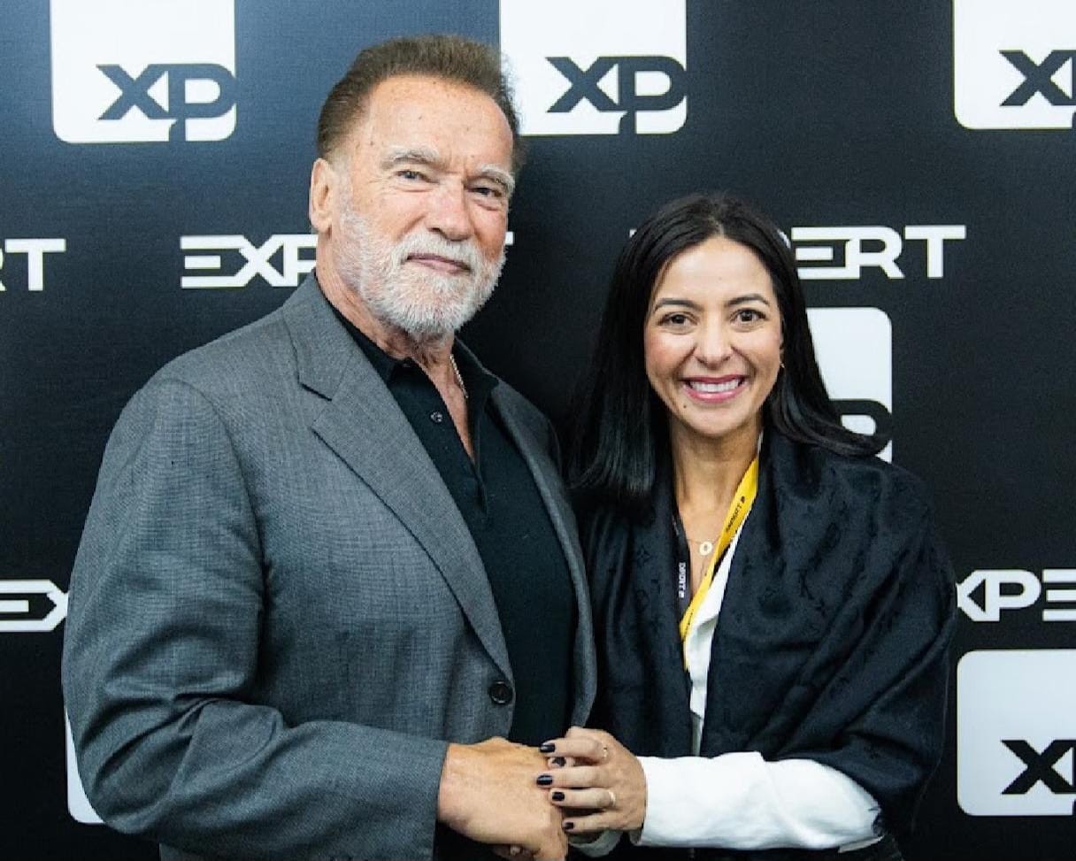 Arnold Schwarzenegger, ator e ex-governador da Califórnia (EUA), e Cecília Perini, sócia e líder da XP sem Minas Gerais
