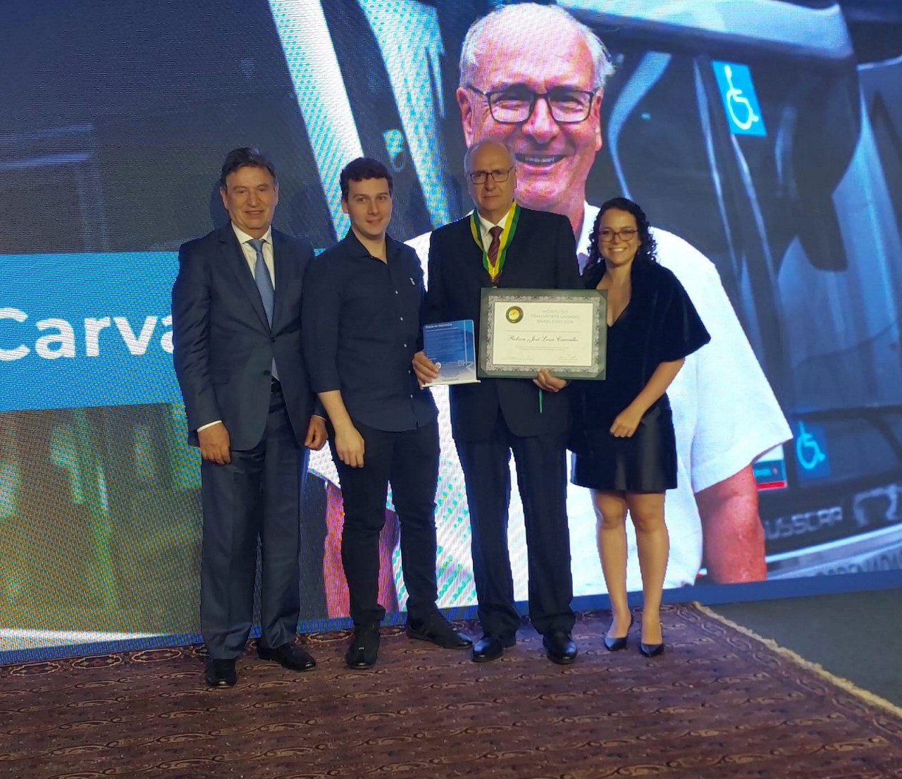Na entrega da Medalha do Mérito do Transporte Urbano Brasileiro,  Rubens Lessa Carvalho, presidente da Fetram, Sintram e conselheiro da NTU;  Vitor Perez Lessa Carvalho, Robson Lessa e Bruna Perez Lessa Carvalho. 
