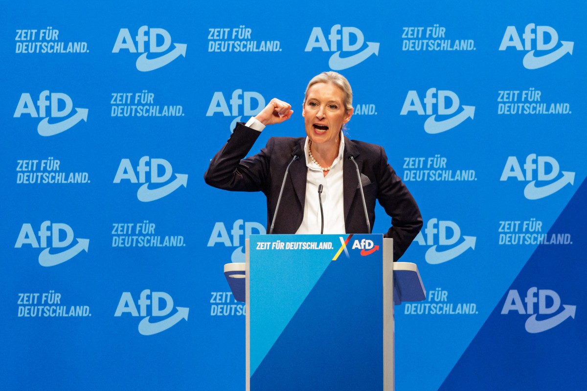 Alice Weidel, co-leader of Germany's far-right Alternative for Germany (AfD) party, addresses delegates during a party congress on January 11, 2025 in Riesa, eastern Germany. Ahead of general elections scheduled for February 23, 2025, AfD delegates confirmed the candidacy of their party's co-leader Alice Weidel as candidate for chancellor, and were expected to adopt a roadmap that includes leaving the euro currency and taking a hard line on migration policy. (Photo by JENS SCHLUETER / AFP)