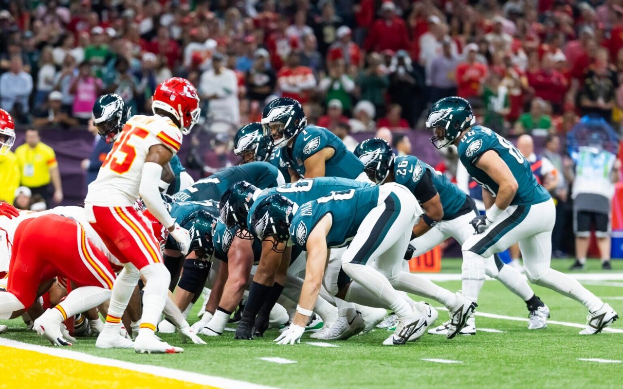 Feb 9, 2025; New Orleans, LA, USA; Philadelphia Eagles quarterback Jalen Hurts (1) lines up for the tush push play on the goal line against the Kansas City Chiefs during Super Bowl LIX at Ceasars Superdome. Mandatory Credit: Mark J. Rebilas-Imagn Images