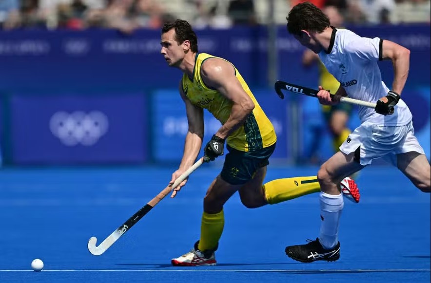 Thomas Craig é um atleta da seleção australiana de hóquei sobre a grama