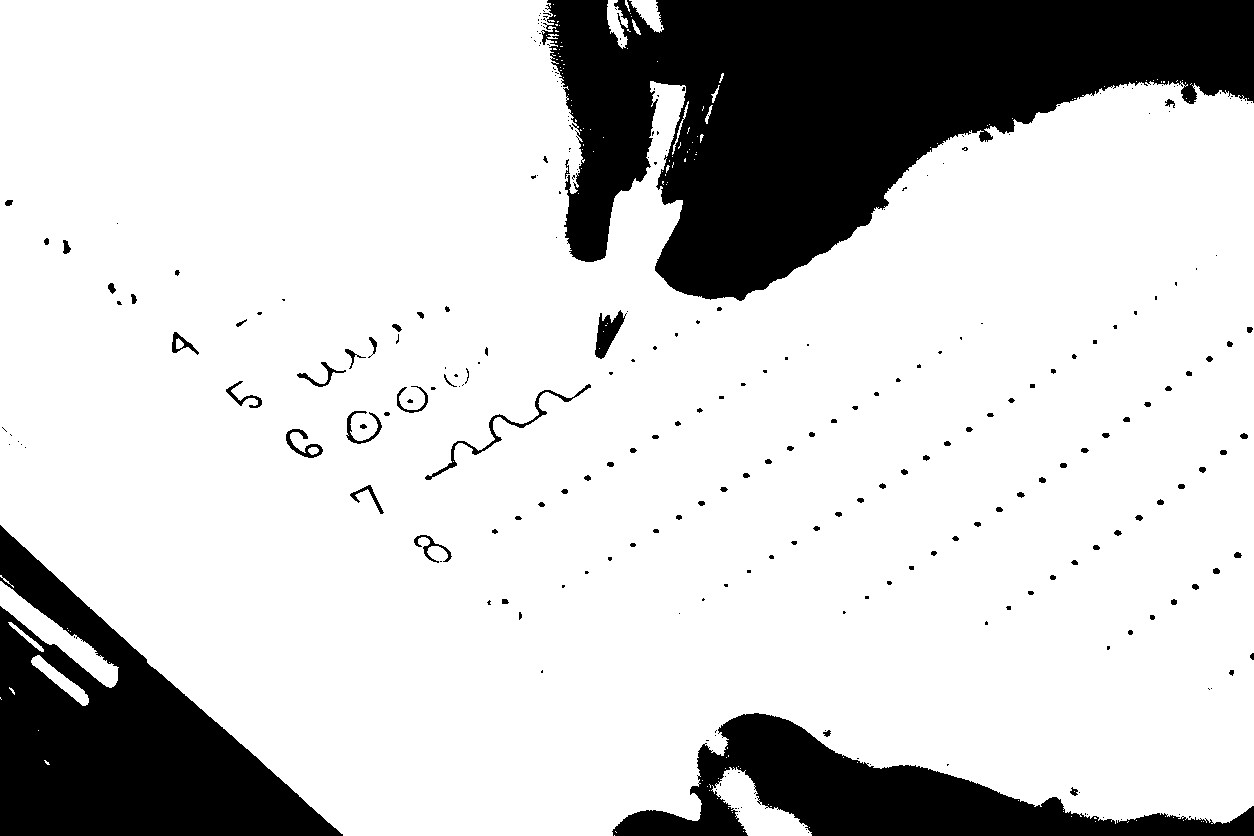 child's hand holding pencil Close-up, preschooler practices writing first letters in notebook, Education and literacy