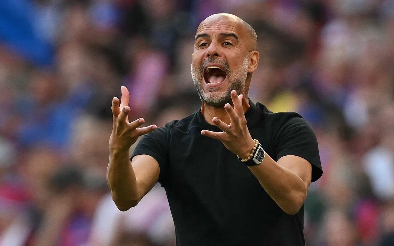 Guardiola comandará o Manchester City na disputa do Mundial de Clubes (Foto: Glyn Kirk/AFP)