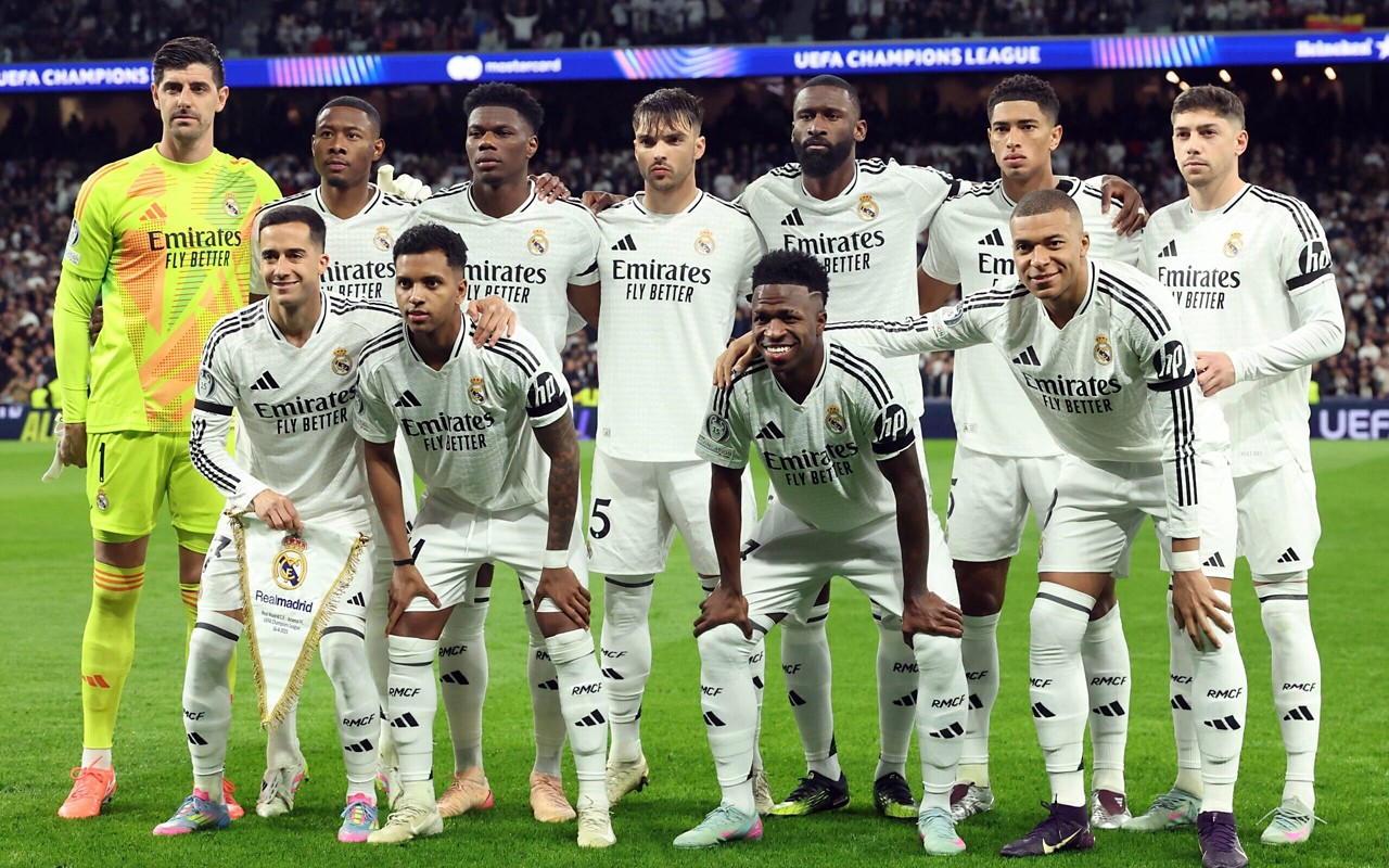 Jogadores do Real Madrid na partida contra o Arsenal (Foto: Pierre-Philippe MARCOU / AFP)