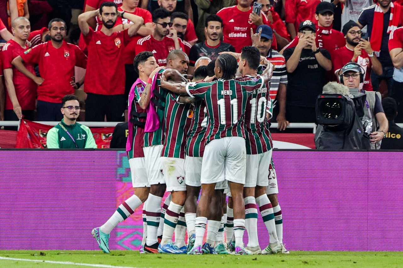 Jogadores do Fluminense comemoram após John Arias abrir o placar, em cobrança de pênalti