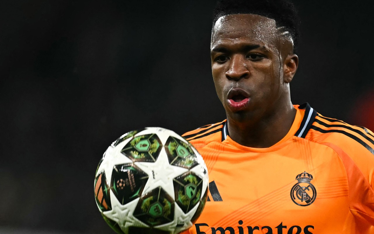 Real Madrid's Brazilian forward #07 Vinicius Junior eyes during the UEFA Champions League football match between Manchester City and Real Madrid at the Etihad Stadium in Manchester, north west England, on February 11, 2025. (Photo by Paul ELLIS / AFP)
